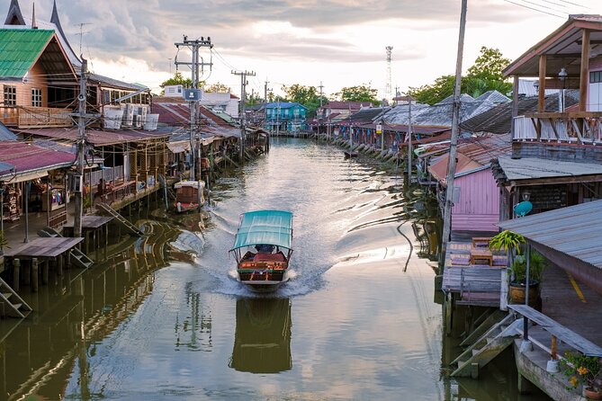 Amphawa Floating Market & Maeklong Railway Train Market Tour - Maeklong Railway Train Market: the moment the stalls fold back