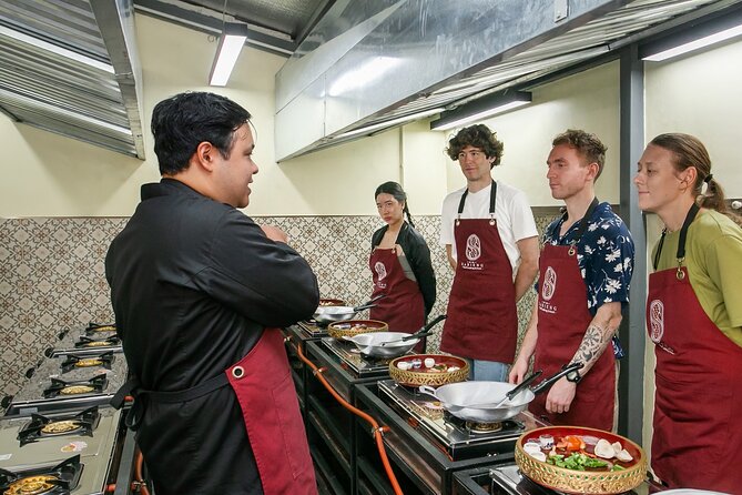 Authentic Thai Cooking with the Largest market visit &TukTuk ride - What you’ll cook: pad Thai, curries, and mango sticky rice