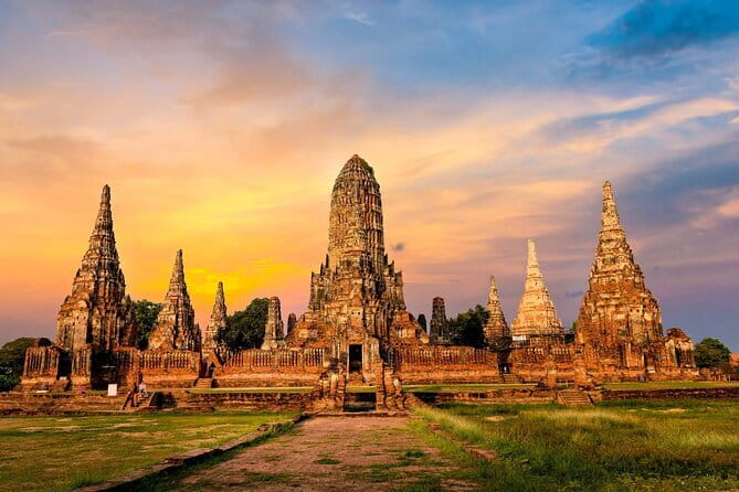 Ayutthaya, Damnoen Floating & Maeklong Railway Market Day Tour - Ayutthaya Historical Park: Wat Mahathat and Buddha roots