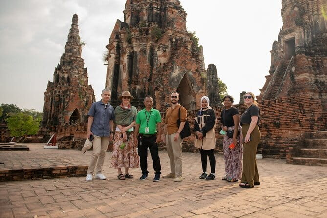 Ayutthaya, Damnoen Floating & Maeklong Railway Market Day Tour - Maeklong Railway Market: the moment the train arrives