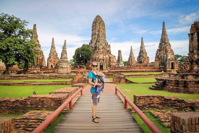 Ayutthaya Sunset Tour: Iconic Temples & Scenic River Boat Ride - Wat Mahathat: the famous Buddha head in the roots