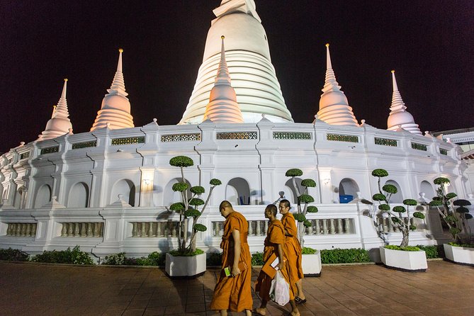 Bangkok by Night: Temples, Markets and Food Tuk-Tuk Tour - Wongwian Yai street market stop: snacks and local rhythm