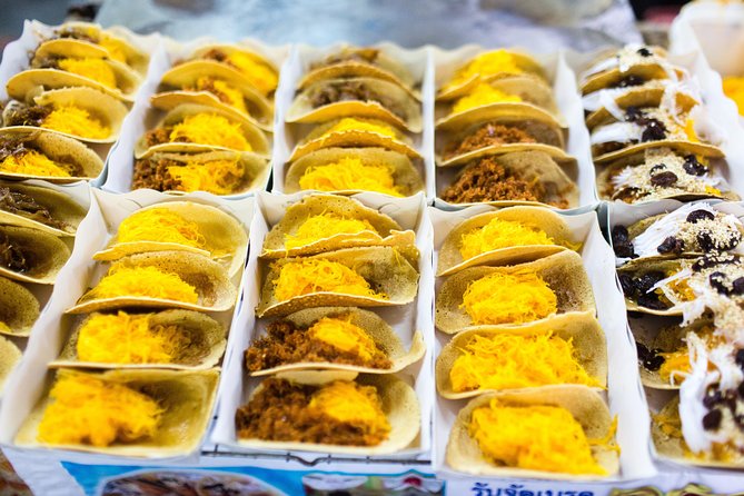 Bangkok by Night: Temples, Markets and Food Tuk-Tuk Tour - Dinner by the river and dessert in the loop