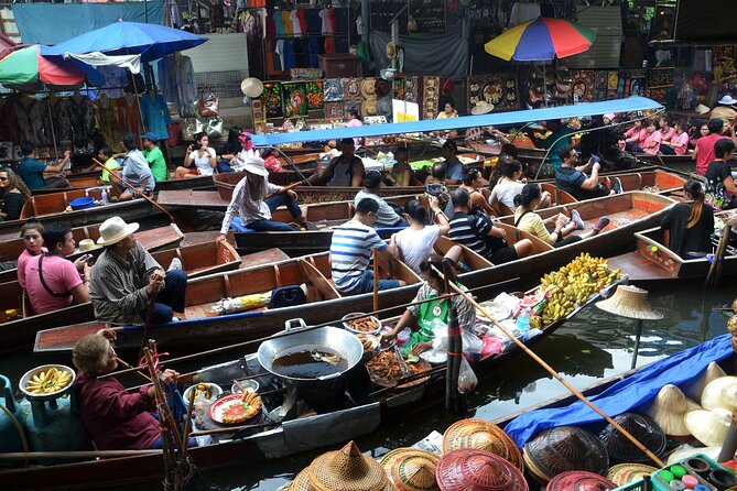 Bangkok: Floating Market and Train Tour with Guide in Spanish and English - Stop 4: Damnoen Saduak Floating Market and the canal boat ride