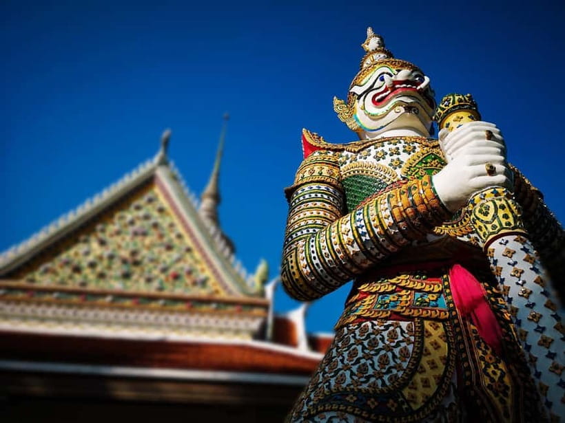 Bangkok: Grand Palace, Wat Pho, Wat Arun Sacred & Local Tour - Wat Arun at the river: spires, porcelain, and photo planning