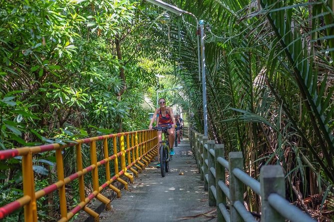 Bangkok Jungle Bike Tour - Hotel-pickup & Lunch - Bang Krachao biking: canals, stilt houses, markets, and wildlife