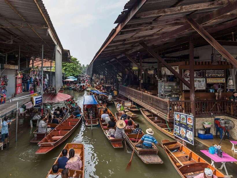 Bangkok: Railway and Floating Market Tour with Dragon Temple - Damnoen Saduak Floating Market: A canal ride that feels more local