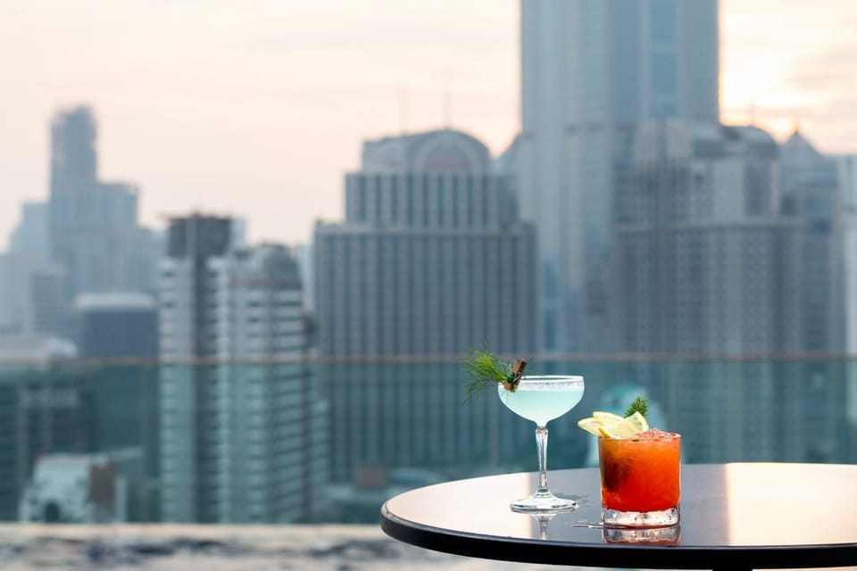 Bangkok: RedSquare Rooftop Bar at Novotel Sukhumvit 4 - Price and logistics: $73 for up to 2, and what you’re really paying for