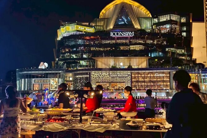 Bangkok Sawasdee Chaophraya Dinner Cruise from ICONSIAM - The river route: Wat Arun and the Grand Palace glow