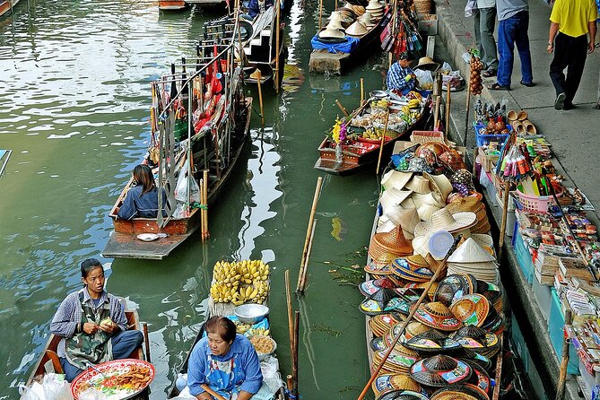 Damnoen Saduak Floating Market and Maeklong Railway Market Tour - Stop 3: Wat Bang Kung’s Banyan Roots (Bot Prok Po) and the 18th-Century Story