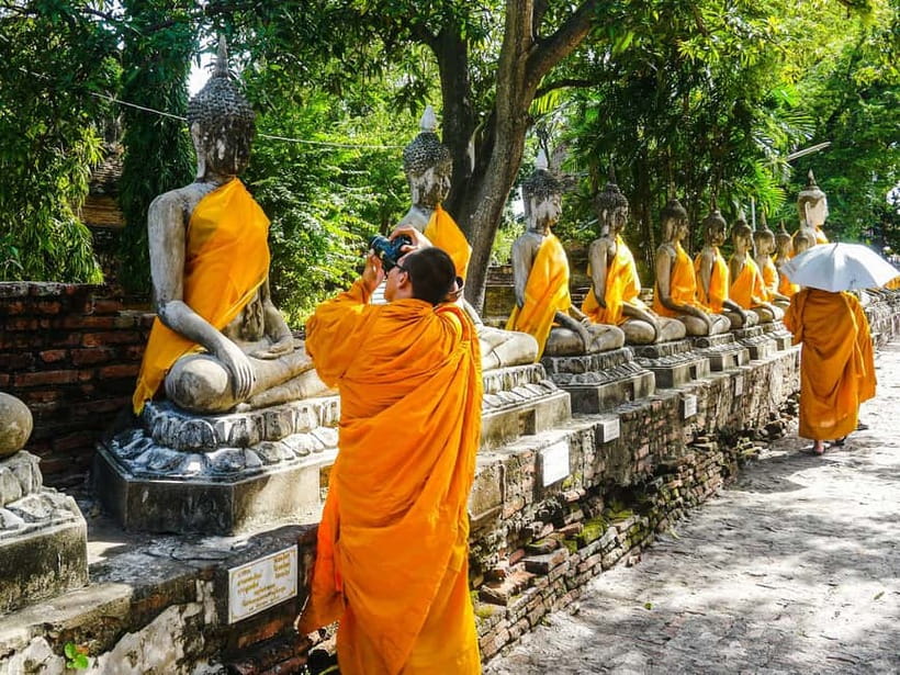 From Bangkok: Ayutthaya Heritage Tour with Sunset Boat Ride - Wat Yai Chai Mongkhon: chedi height and that reclining Buddha moment