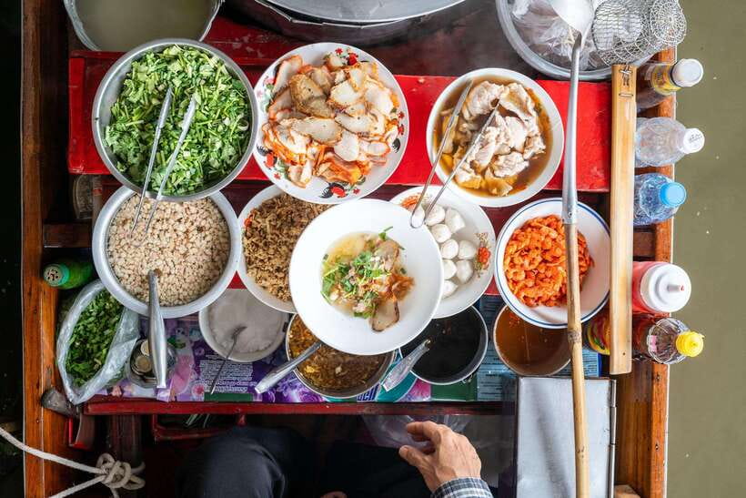 From Bangkok: Railway & Damnoen Saduak Floating Market Tour - Lao Tuk Luck (Old Damnoen Saduak): a shorter stop with older-style trading