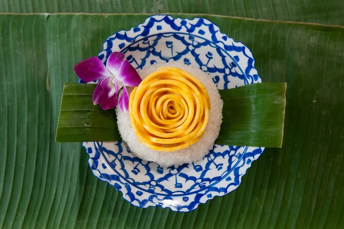 Hands-on Thai Cooking Class & Market Tour in Sukhumvit - Fruit carving vs market tour: two session styles