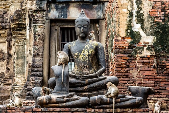 Lopburi Monkey Temple & Ayutthaya Old City Tour From Bangkok - Stop 1: Phra Prang Sam Yot and the Khmer footprint in Lopburi