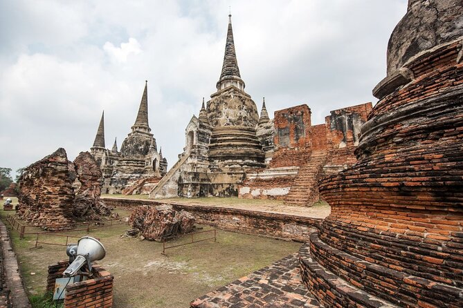 Lopburi Monkey Temple & Ayutthaya Old City Tour From Bangkok - Stop 5: Wat Phra Sri Sanphet and the restored chedis on the island