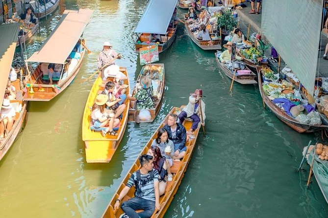 Maeklong Railway & Floating Market Tour (Private & All-Inclusive) - Wat Bang Kung: banyan roots and a temple that feels partly alive