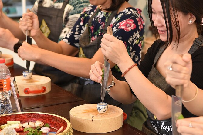 Thai Cooking Class with Market Tour in Sathon Bangkok - Cooking four dishes in a 3.5-hour session