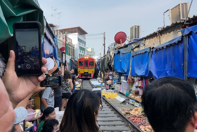 Train & Floating Market Food Adventure + Scenic train ride - Damnoen Saduak Floating Market: getting the boat experience and the best photo windows