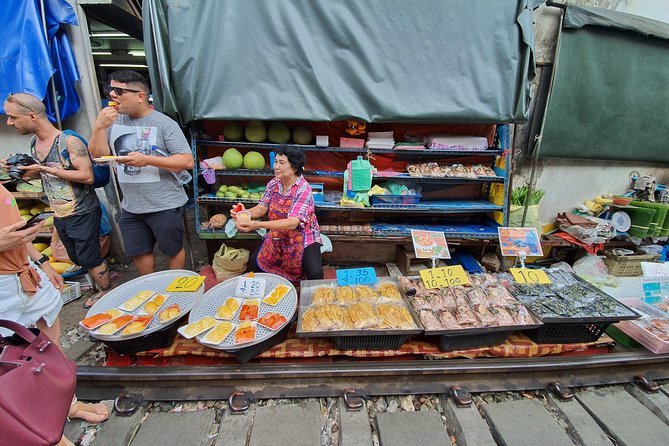 Train & Floating Market Food Adventure + Scenic train ride - Food, fruit, and bartering practice (this is where the tour earns its keep)